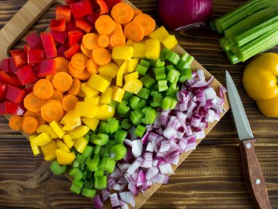 cutting-board-filled-with-a-rainbow-of-chopped-vegetables